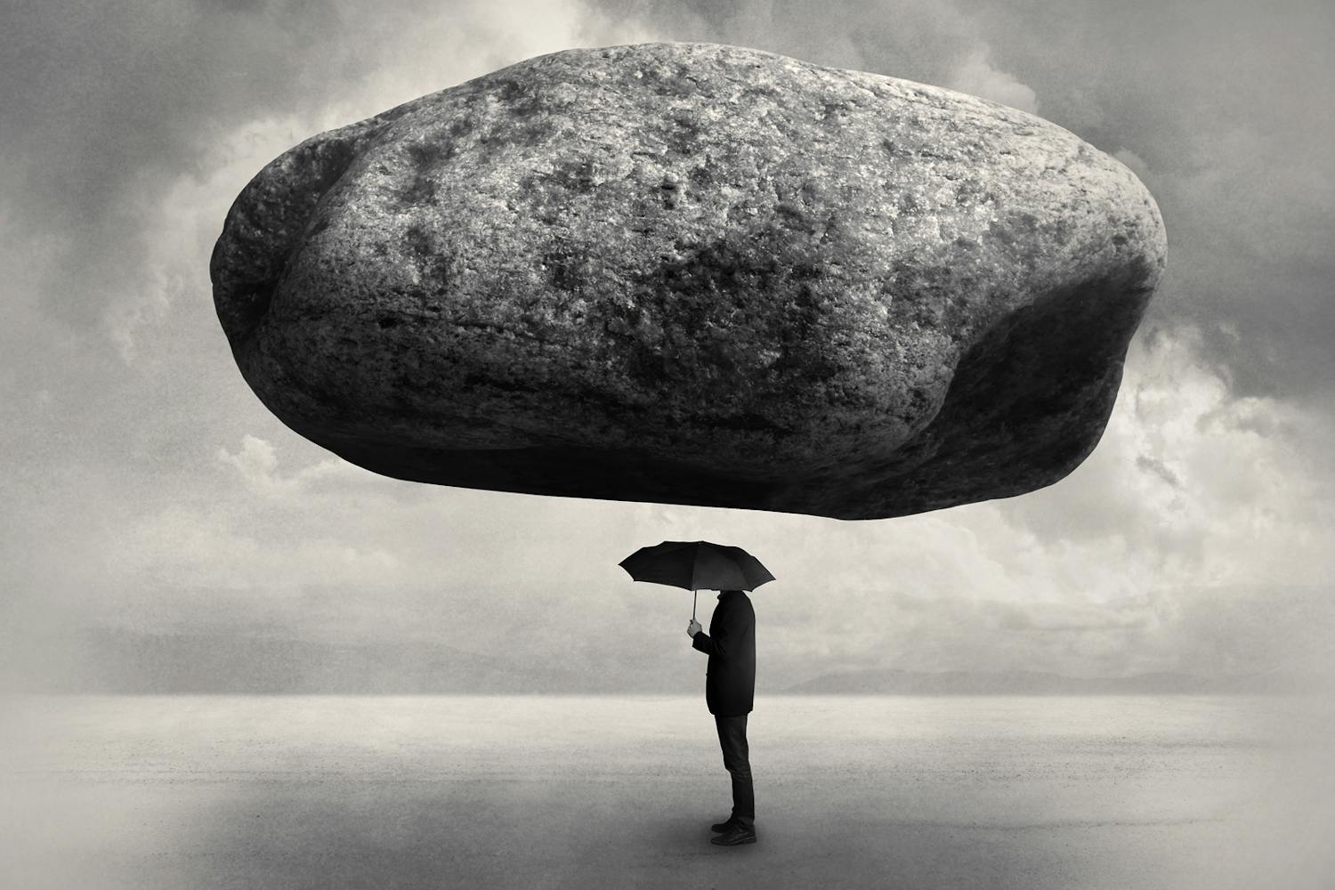 Mies puku sateenvarjo iso kivi